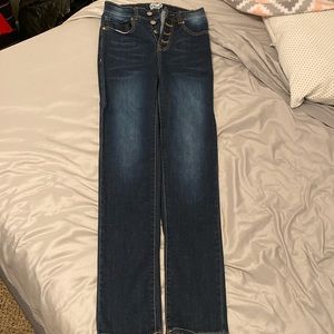 Dark wash jean, 4 button fly, 4 pockets size small